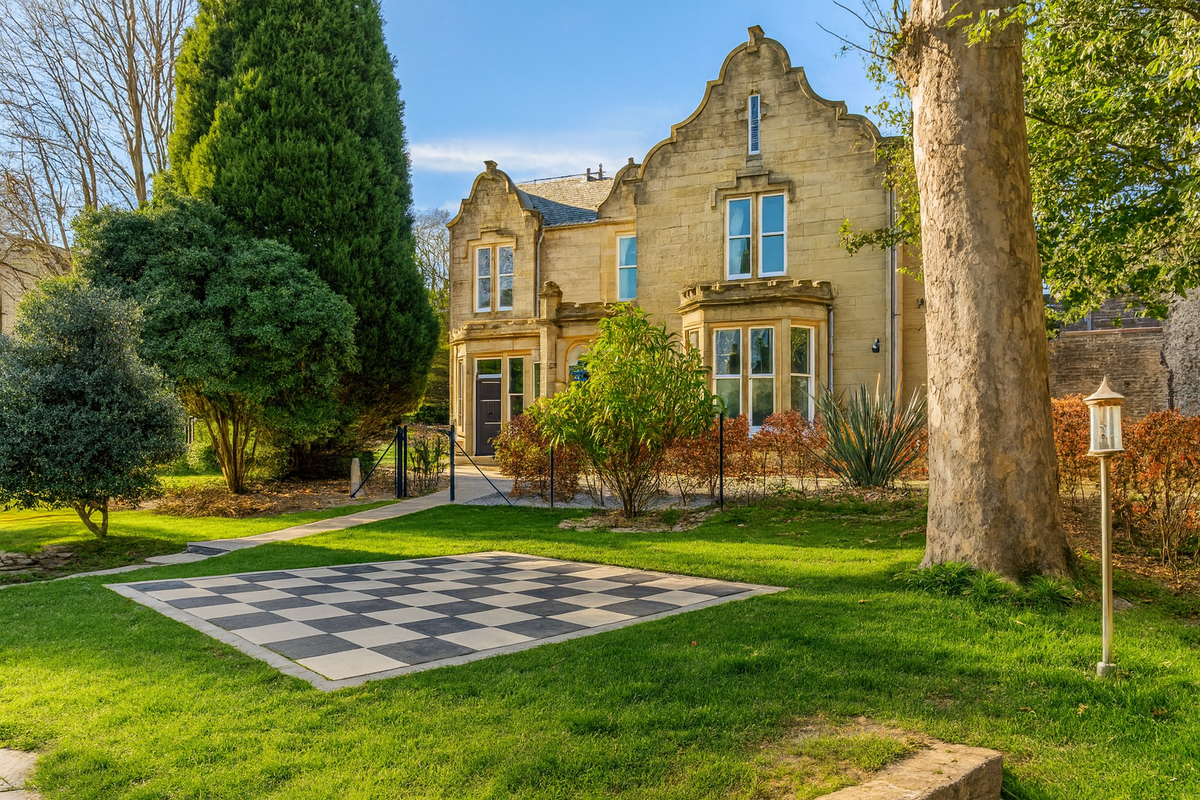 credit: https://cdn.jsdelivr.net/gh/Rosehouse1618/ilm-photo-gallery-assets/gallery/Student_Hall_Outdoor_Chess_1764992511615.png