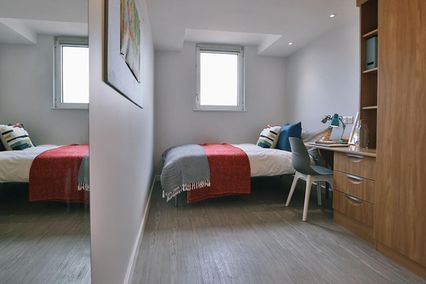 credit: https://www.iqstudentaccommodation.com/sites/default/files/styles/slider/public/2018-12/iQSteel_BronzeEnSuitePlus1_Gallery_0.jpg?itok=BpQVzuOv